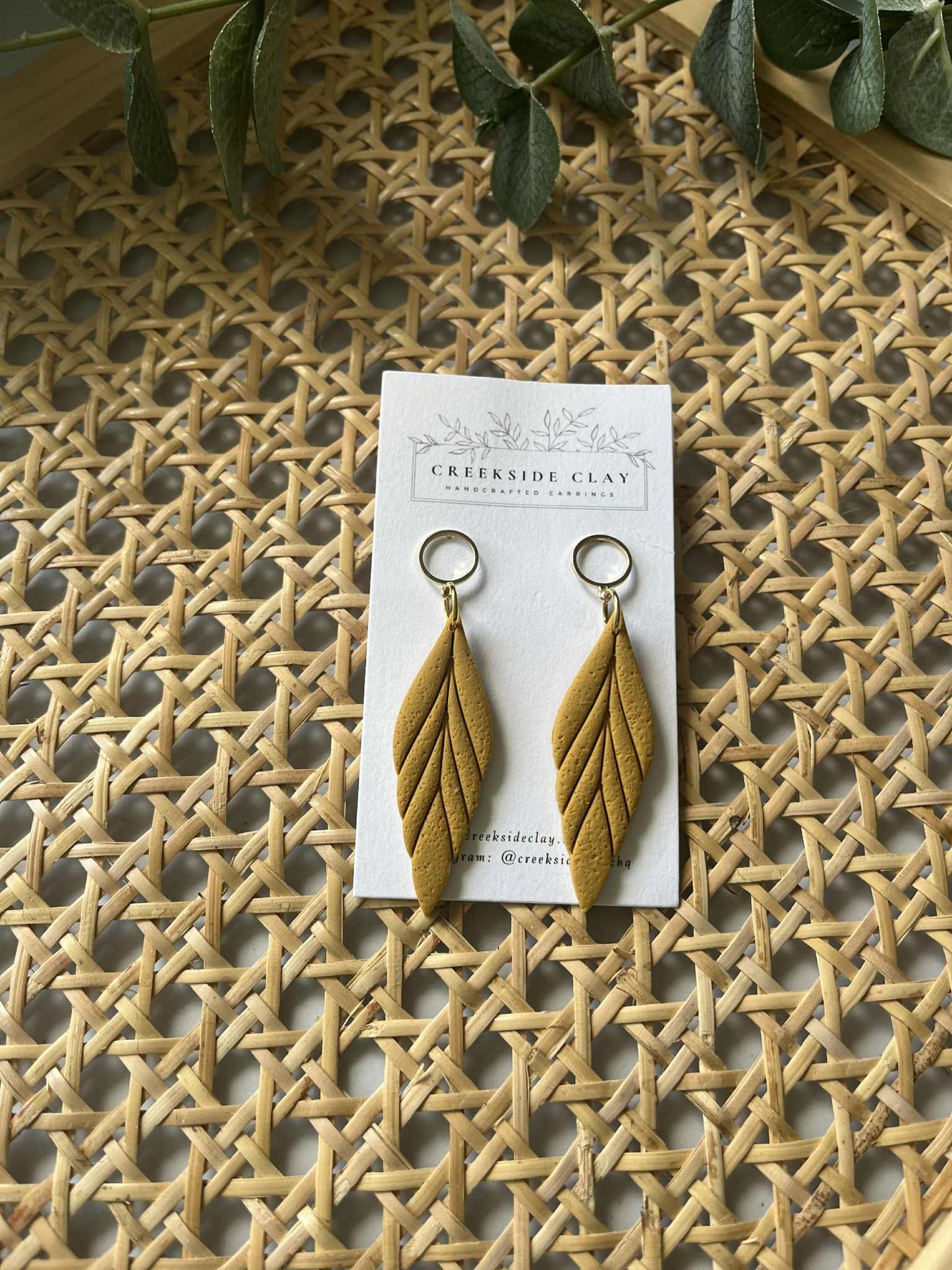 Clay Feathers with gold circle studs