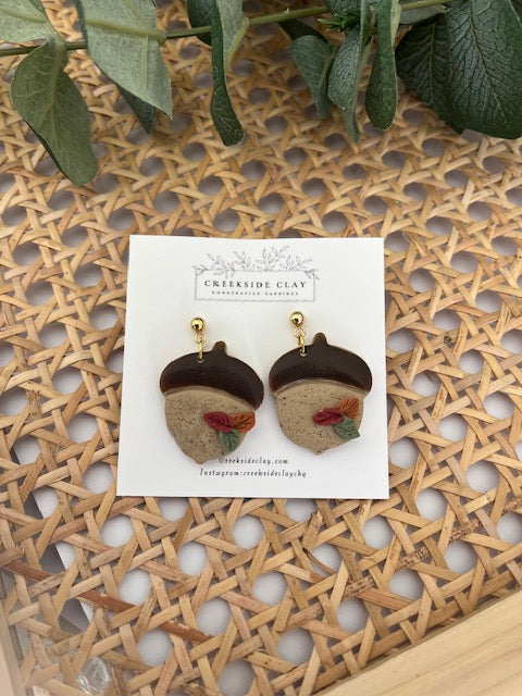 Acorns with fall leaves